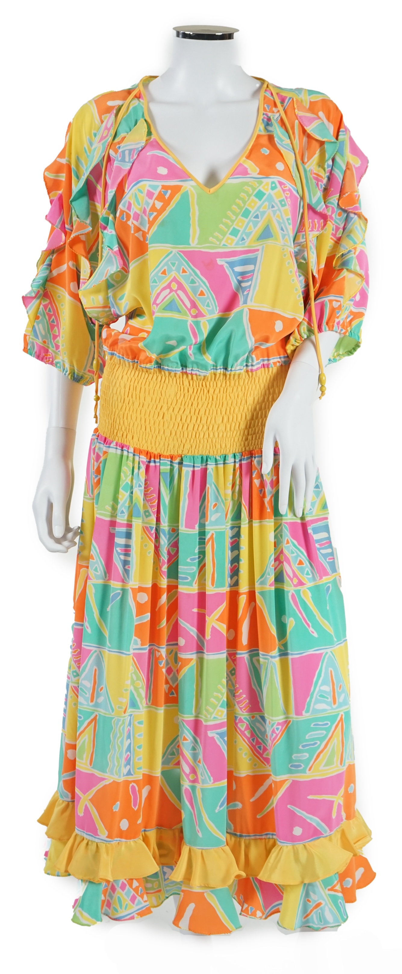 Three multi coloured dresses, no labels. Approx size 10-12 Proceeds to Happy Paws Puppy Rescue